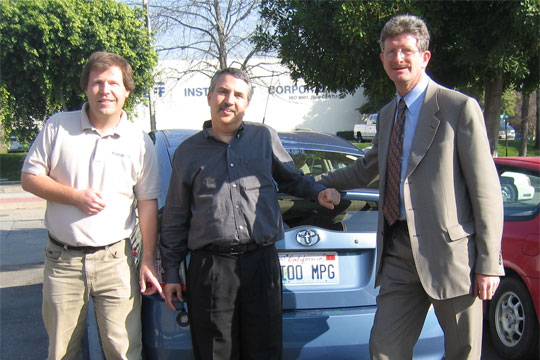 Thomas Friedman, Greg Hanssen and Felix Kramer with an EDrive plug-in hybrid