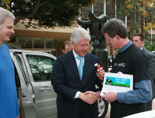 Felix gives President Clinton some souvenirs