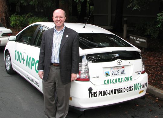 James L. Connaughton, Chairman of the Council on Environmental Quality, in front of Felix's PRIUS+