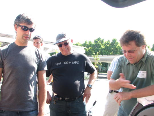 EDrive's Greg Hanssen explains his prototype to Google's Larry Page and Calcars' Ron Gremban.